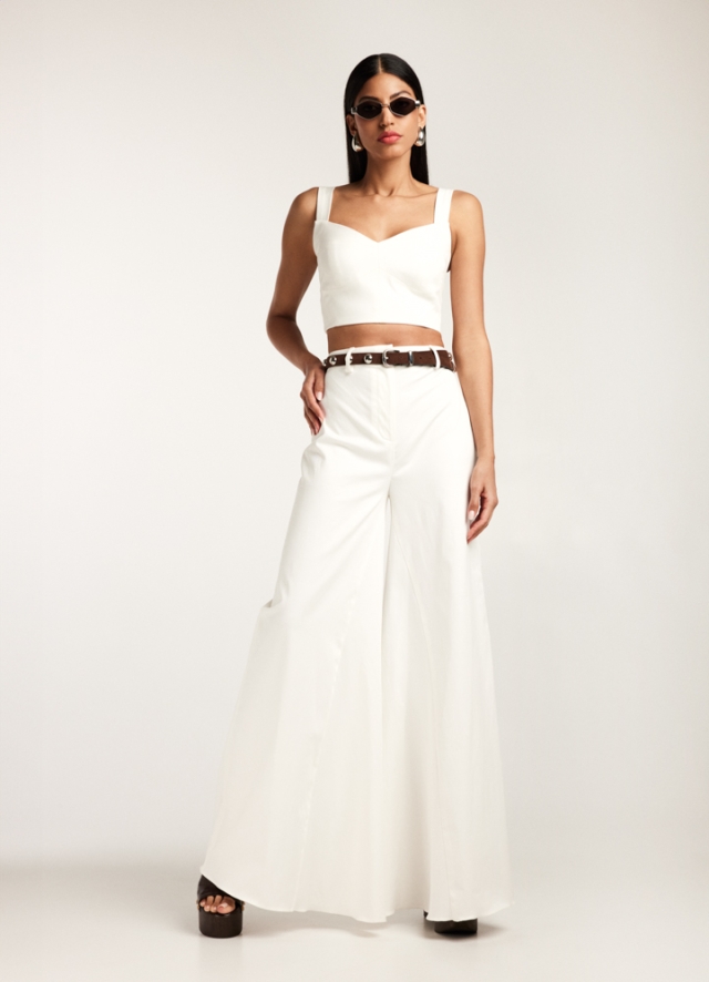 Set alb din bumbac si lyocell format din doua piese: top corset si pantaloni lungi cu talie inalta evazati Cruz